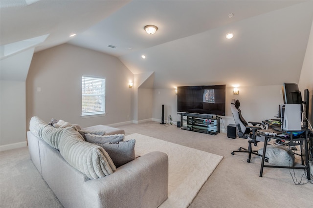 cinema featuring carpet floors and vaulted ceiling