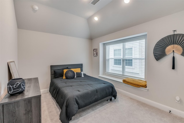 carpeted bedroom featuring lofted ceiling