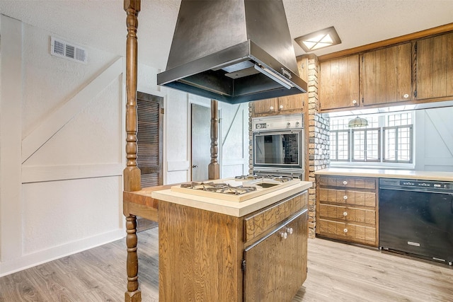 kitchen with black dishwasher, island range hood, light hardwood / wood-style floors, white gas stovetop, and oven