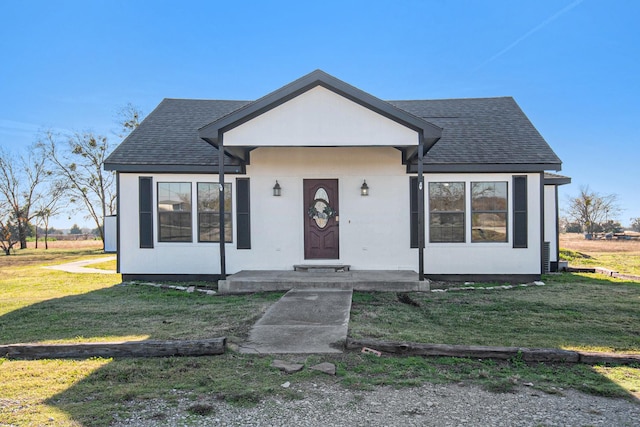 view of front of home with a front yard