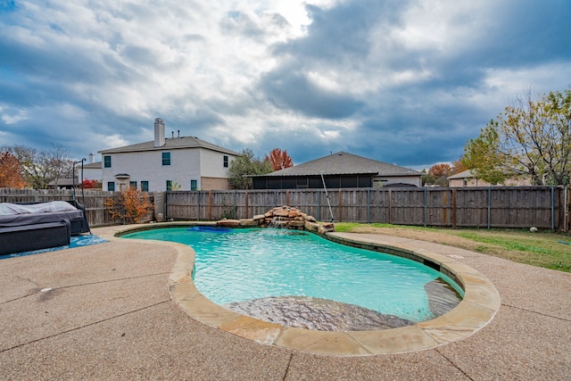 view of swimming pool featuring a patio