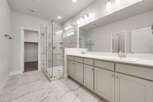 bathroom with vanity and walk in shower