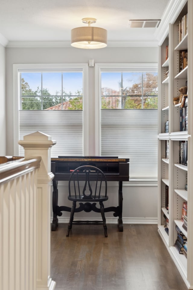 misc room with crown molding and dark wood-type flooring