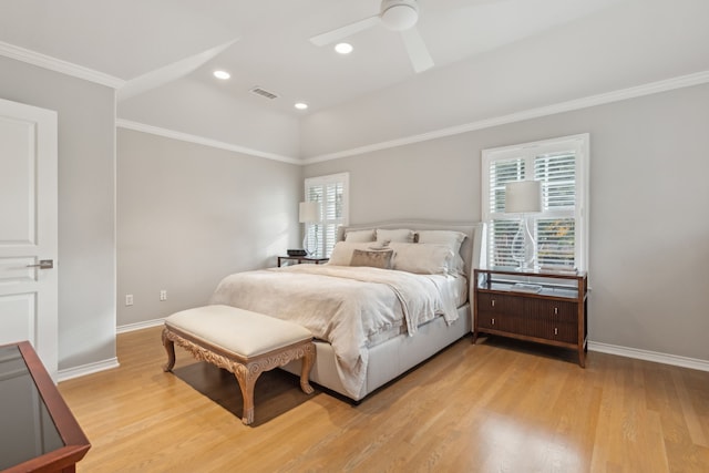 bedroom featuring multiple windows, crown molding, ceiling fan, and light hardwood / wood-style flooring