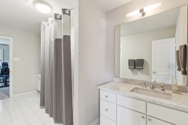 bathroom with vanity and tile patterned floors