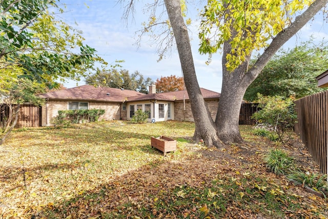 exterior space featuring a lawn