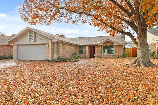 ranch-style home with a garage