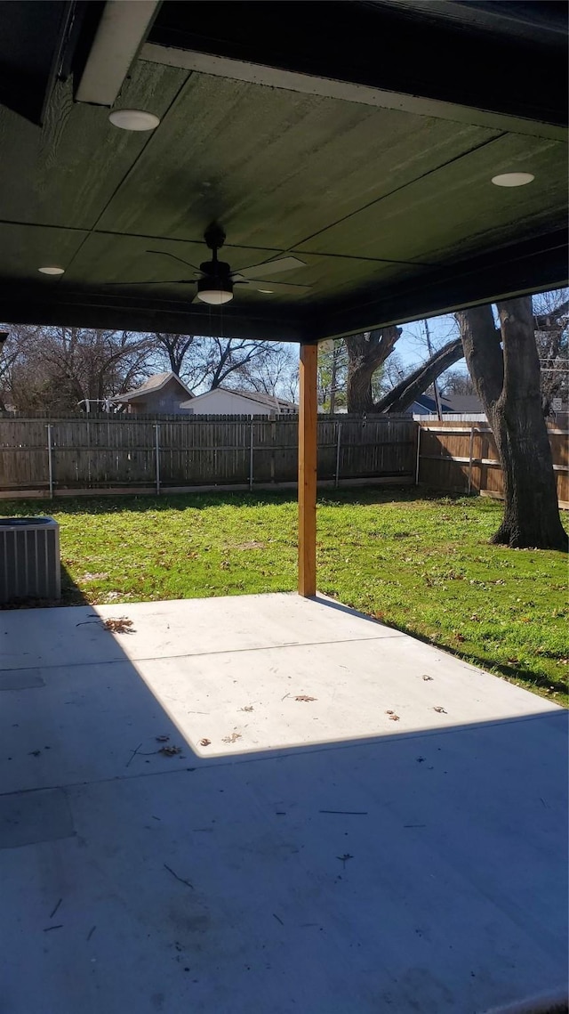 view of patio / terrace featuring ceiling fan and cooling unit