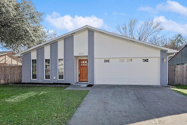 ranch-style house with a garage and a front yard