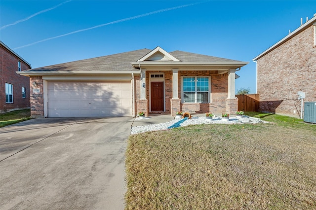 view of front facade featuring a front lawn and a garage