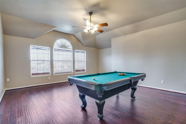 rec room with a textured ceiling, vaulted ceiling, ceiling fan, dark wood-type flooring, and pool table