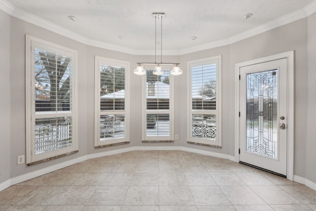 unfurnished dining area with a wealth of natural light, crown molding, and light tile patterned flooring