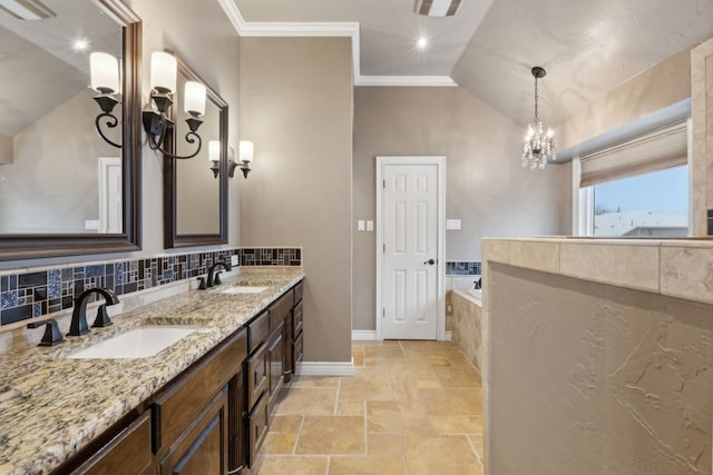 bathroom featuring vanity, vaulted ceiling, crown molding, a chandelier, and a tub