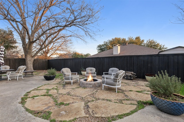 view of patio featuring an outdoor fire pit