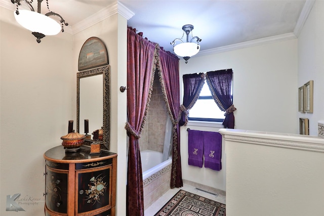 bathroom featuring crown molding, tile patterned floors, and shower / bath combination with curtain