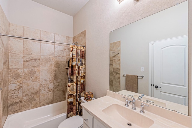 full bath with vanity, toilet, and shower / bath combo with shower curtain