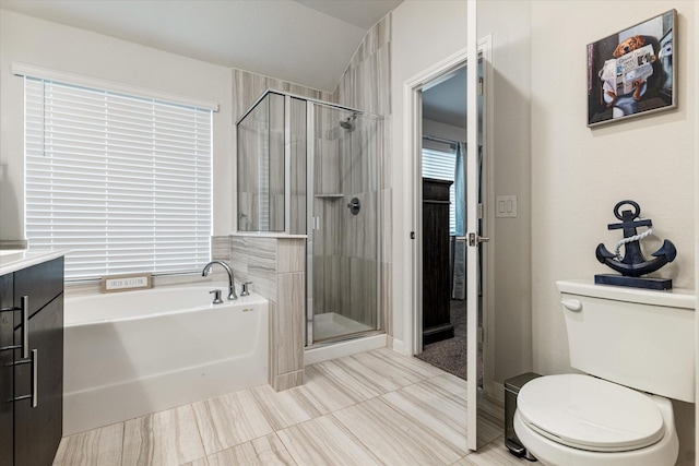 full bathroom featuring tile patterned flooring, vanity, toilet, and plus walk in shower