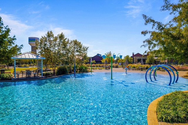 view of swimming pool featuring a gazebo