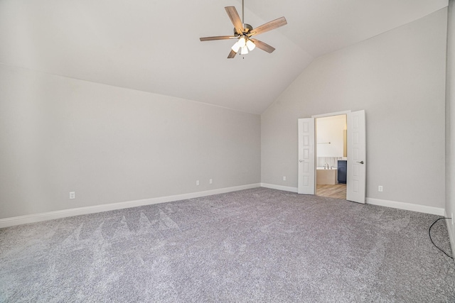 unfurnished bedroom with carpet flooring, ceiling fan, ensuite bathroom, and lofted ceiling