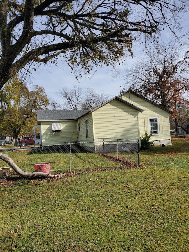 view of property exterior featuring a yard