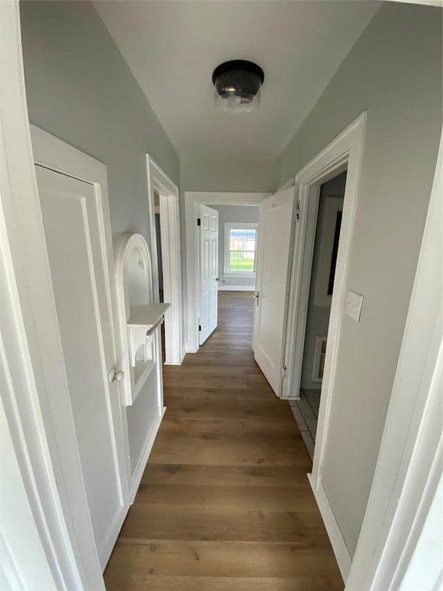 hall featuring dark hardwood / wood-style floors