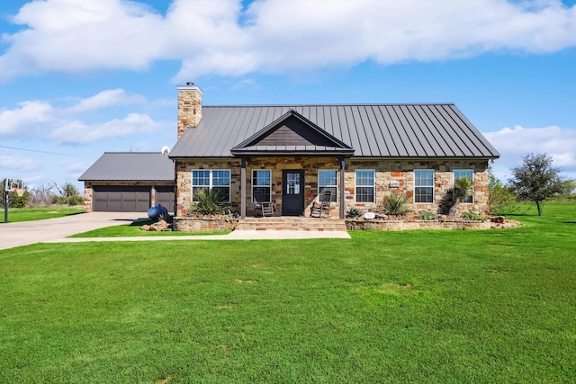 view of front facade featuring a garage and a front lawn