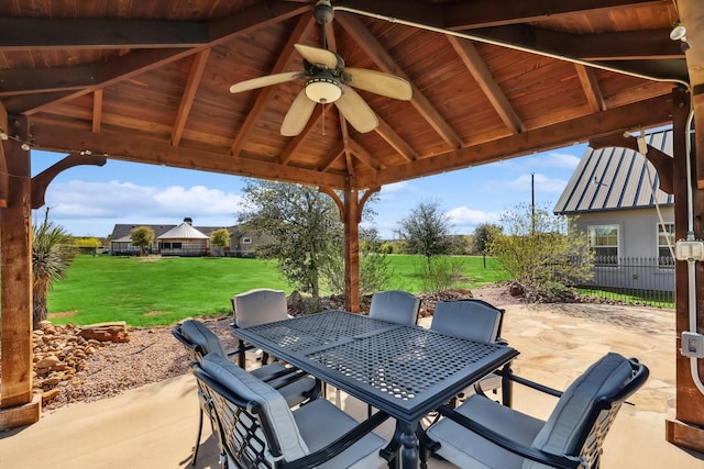 view of patio / terrace featuring a gazebo and ceiling fan