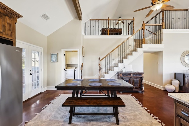 dining area featuring french doors, high vaulted ceiling, ceiling fan, beam ceiling, and washer and clothes dryer