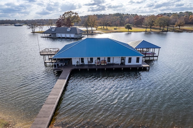 view of dock featuring a water view and central AC