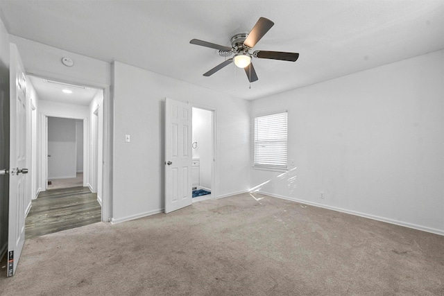 unfurnished bedroom with carpet floors and ceiling fan