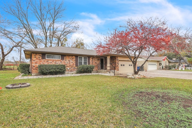 single story home featuring a front yard and a garage