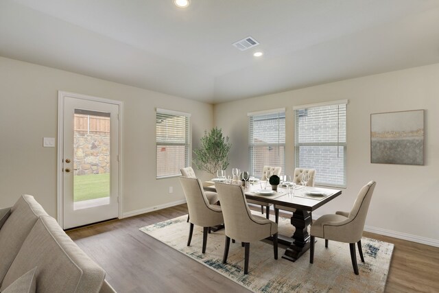 unfurnished room with ceiling fan, wood-type flooring, and vaulted ceiling