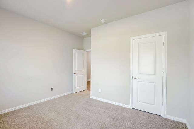 unfurnished living room with ceiling fan and light hardwood / wood-style flooring