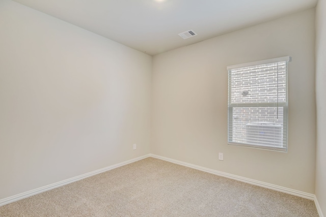 spare room featuring light wood-type flooring, ceiling fan, and lofted ceiling