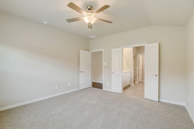 full bathroom with vanity, tiled shower / bath combo, and toilet