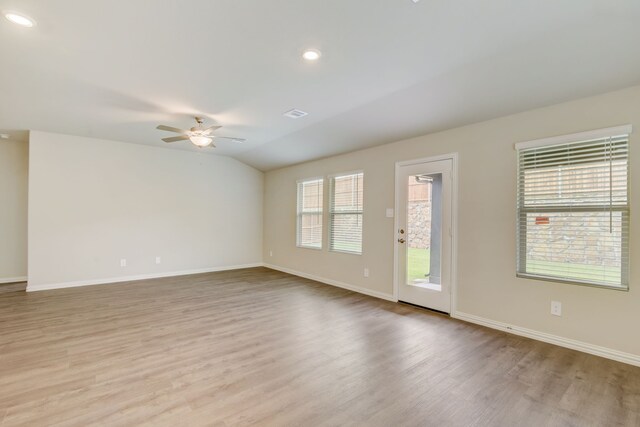 kitchen featuring white cabinets, appliances with stainless steel finishes, a kitchen island with sink, and sink