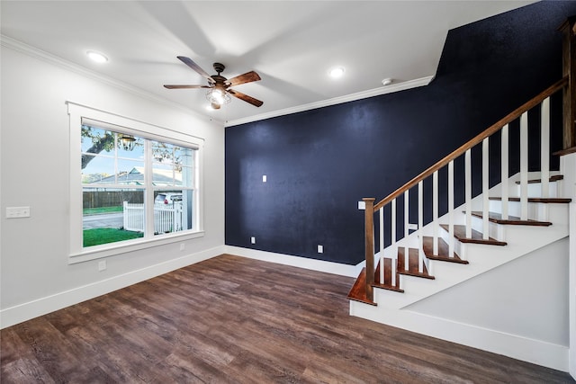 interior space with hardwood / wood-style floors, ceiling fan, and crown molding