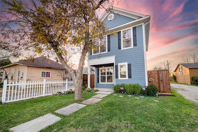 view of front property with a yard