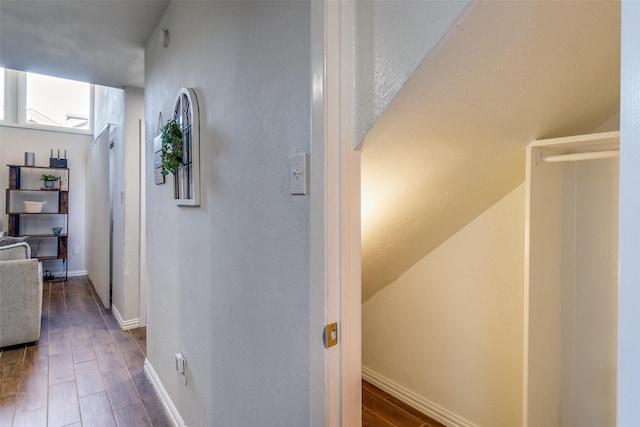 hall with dark hardwood / wood-style floors