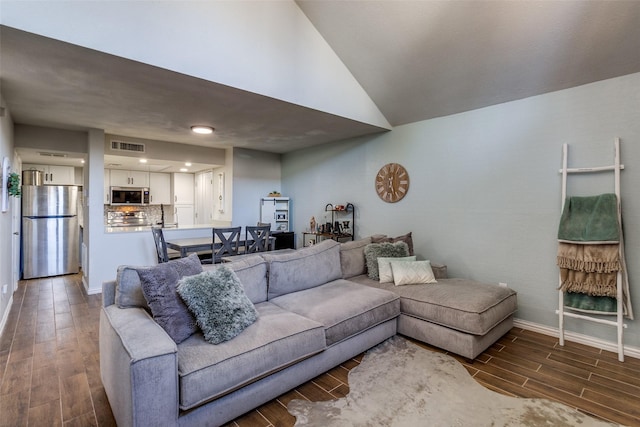 living room featuring dark wood-type flooring