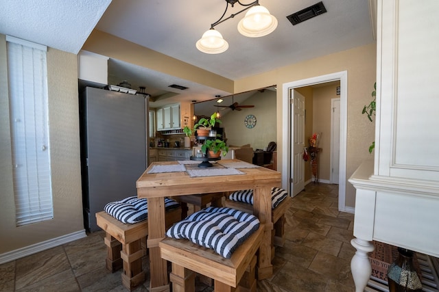 dining area featuring ceiling fan