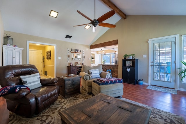 living room featuring beamed ceiling, ceiling fan, wood-type flooring, and high vaulted ceiling