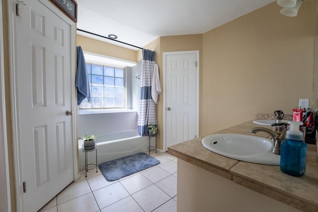 bathroom featuring vanity, a bath, and tile patterned flooring