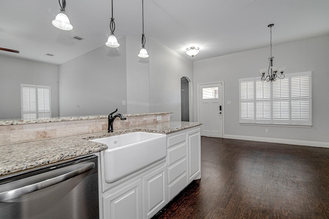 kitchen featuring sink, dishwasher, light stone counters, white cabinets, and decorative light fixtures