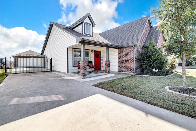 view of front of home with a porch and a front lawn