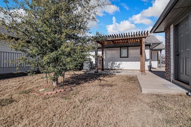 view of yard featuring a pergola and a patio