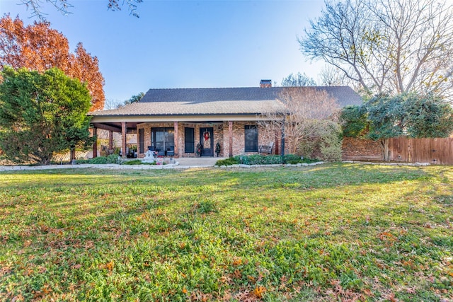 view of front of house with a front lawn