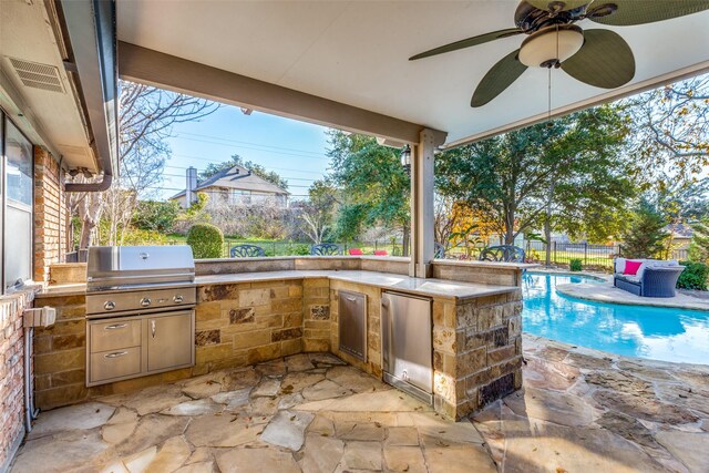 bathroom featuring vanity, tiled shower, ceiling fan, crown molding, and tile patterned floors