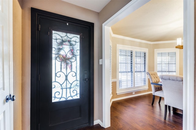 foyer with crown molding and dark wood-type flooring