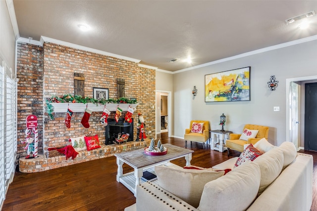 living room with hardwood / wood-style floors, a wood stove, and ornamental molding